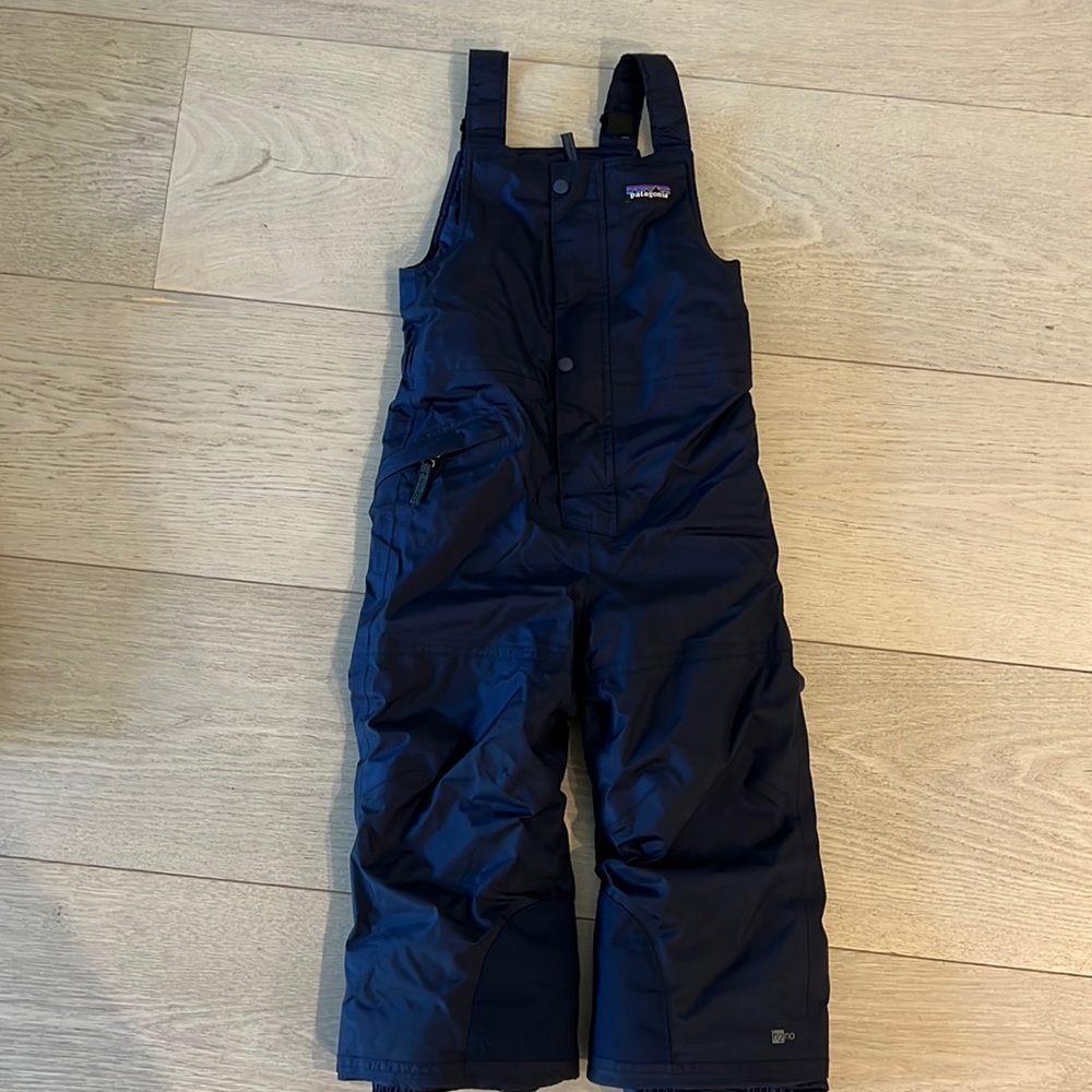Baby snow pile bib size 4